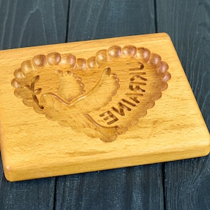 Gingerbread mold pattern carved. Dove of peace. Wooden cookie cutter. Baking Springerle stamp