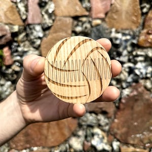 Round wooden comb with magnets. Football beard and mustache comb
