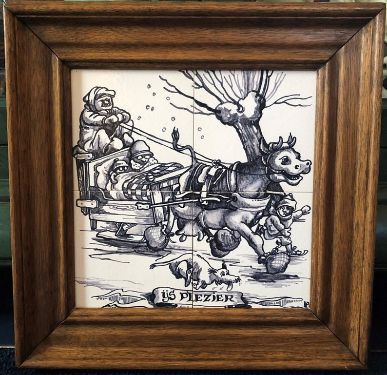 May include: A black and white illustration of a cow pulling a sled with three people on it. The sled is on a snowy surface and there is a tree in the background. The text "ijs plezier" is written on a banner at the bottom of the image.