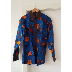 M, L. Overhemd Afrikaanse print. Lange mouwen. Zeer elegante stedelijke stijl. Wasstof. Ankara. Katoen. Uniek. Handgemaakt.
