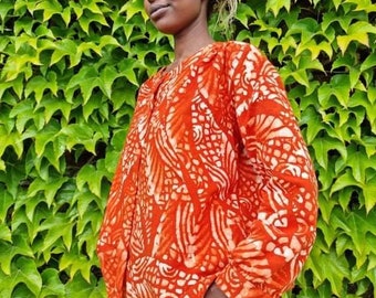 Organic cotton blouse. Artisan luxury. Handmade print. Authentic batik. Sustainable clothing. Use as shirt and jacket. Made in Africa.