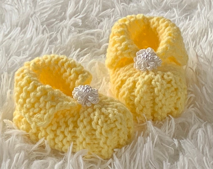 Knit Yellow Baby Slippers with White Flowers (Unisex: 5 Infant Sizes)