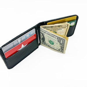 Cartera plegable con clip para billetes con acción de resorte, ventana exterior para identificación, cartera delgada de vinilo con textura negra, tarjetero minimalista para efectivo y identificación