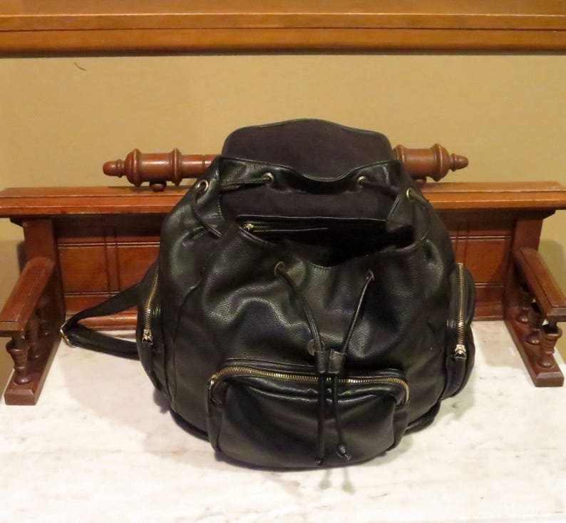 vintage black leather backpack