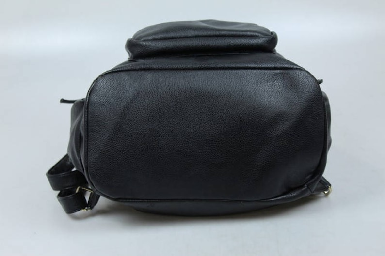 vintage black leather backpack