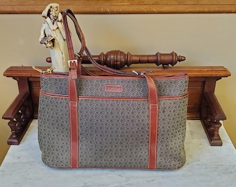 Bolso de viaje vintage Hartmann Wings Diamond en jacquard italiano, ribete de cuero color coñac y dos correas ajustables para el hombro - Muy buen estado