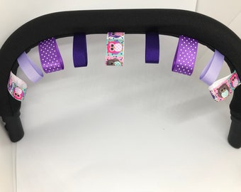 Bumper bar cover with taggies- purple theme