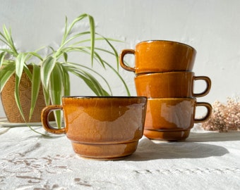 4 vintage coffee/tea cups in black caramel earthenware - Vintage coffee service - Tea cups - Vintage mugs - Vintage coffee cups