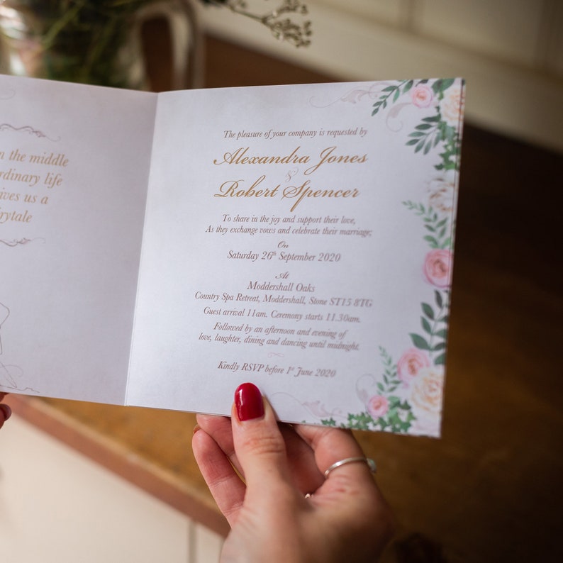 May include: A wedding invitation with gold text on a cream background. The invitation includes the names Alexandra Jones and Robert Spencer, event details, and floral accents. The RSVP date is June 1, 2020.