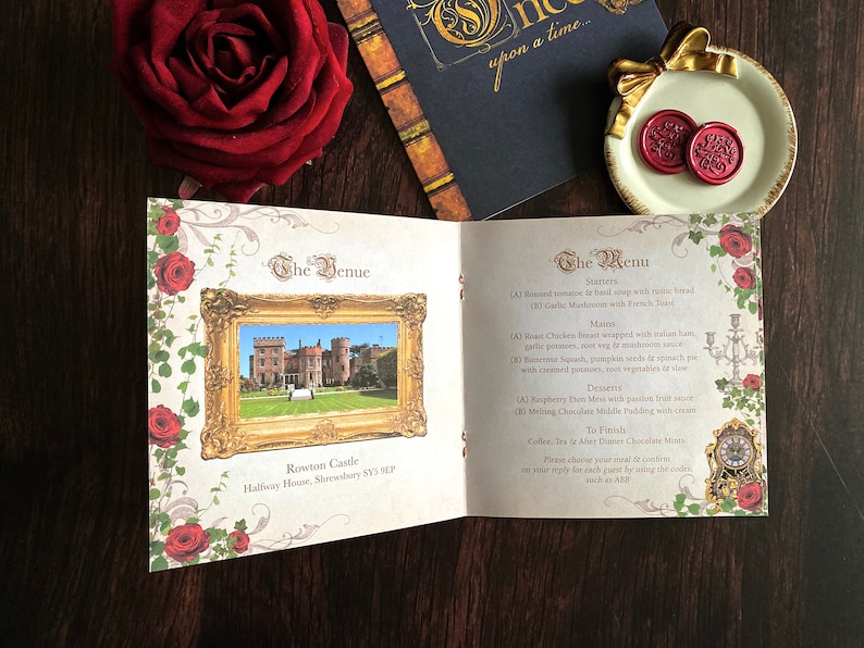 May include: An open wedding invitation with a castle image in a gold frame, surrounded by red roses and decorative flourishes. The menu lists starters, mains, and desserts. A red rose and a decorative plate with wax seals are also visible.