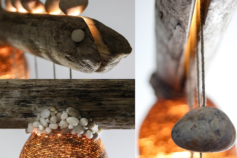 May include: A rustic wooden lamp with a fish-shaped design and a woven shade. The lamp is decorated with small stones and has a warm, inviting glow.