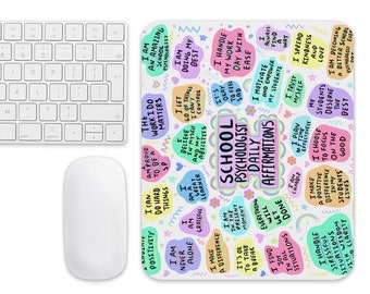 May include: A colorful mouse pad with a white background and a variety of affirmations for school psychologists. The text includes phrases like "I am an amazing school psychologist", "I handle my work day with ease", and "I make a difference in my students' lives".