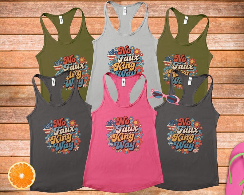 May include: A collection of six racerback tank tops in various colors, including olive green, gray, and pink. Each tank top features the text "No Faux King Way" surrounded by a floral design with patriotic colors.