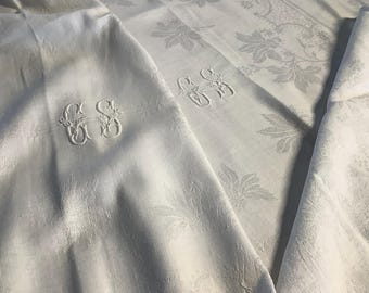 アンティークのフランス製ダマスク織リネンのテーブルクロスとそれに