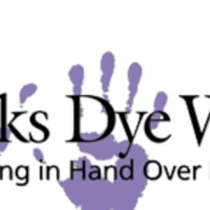 May include: Purple handprints with the text "Week's Dye Works" and the tagline "Specializing in Hand Over Dyed Fibers".