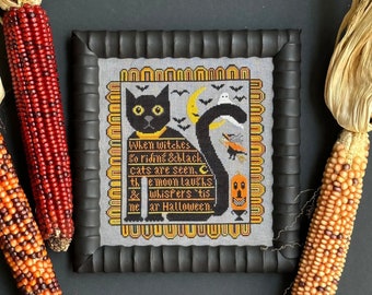 May include: Black cat cross stitch pattern with the text "When witches so riding & black cats are seen. The moon laughs & whispers 'tis near Halloween."