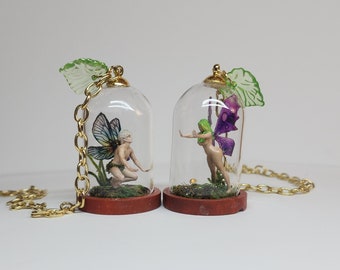 Fairy miniatures  inside a glass dome. Realistic fairy terrariums.Trapped Fairy with mossy grass and mushrooms. Trapped fairy cloche.