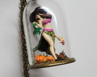 Witch in a glass dome bottle.  Halloween witch charm.