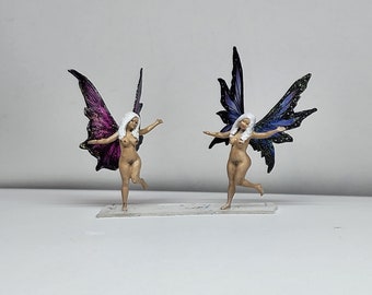 Beautiful light skin dancing fancy wings minature fairy figurines. Nude fairy miniatures. Happy Fairy garden and terrarium miniatures