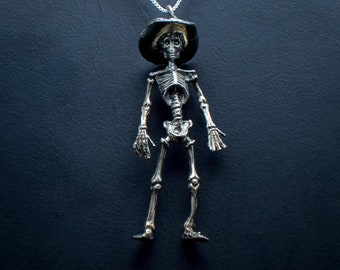 Cowboy Slim Skeleton Sterling Silver pendant.