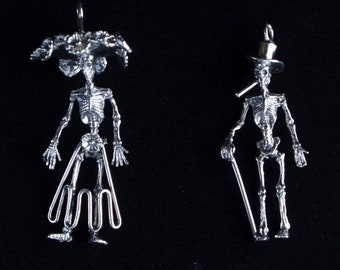 Bones Alive Couple, Sterling Silver Ka Catrina and El Samedi Pendants including a 20 inch Sterling Silver box chain.