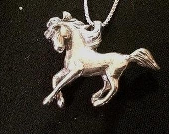Fancy Pony Sterling Silver pendant, cast by hand in Tucson, Arizona. You will love this pony, and your friends will love it too!