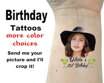 May include: A temporary tattoo with a photo of a woman wearing a black hat and the text "Olivia's 21st Birthday!" with two green margarita glasses on either side of the text.