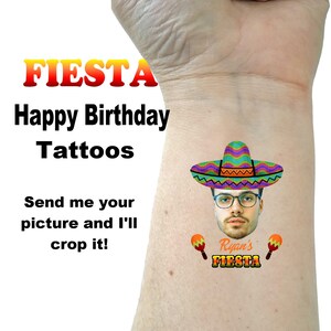 May include: A temporary tattoo featuring a person wearing a colorful sombrero and glasses. The tattoo also includes maracas and the text "Ryan's Fiesta".