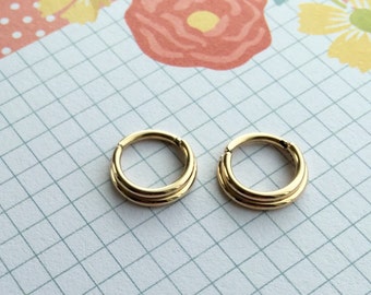 14k Double Septum Clicker 16G Massives Gelbgold 7,5mm