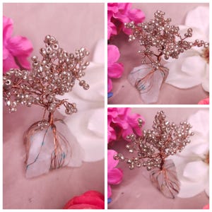copper wire tree of life on raw quartz with silver color beads