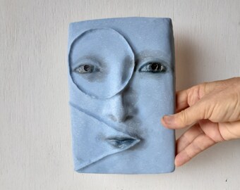 Smoky blue wall sculptural ceramic face plaque, handmade pottery art mask