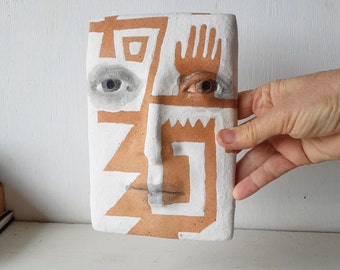 Terracotta orange and white tile face sculpture with sawtooth pattern, ceramic wall art, tribal style art lover gift