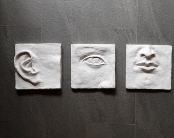 Large white wall art triptych, handmade ceramic classic sculpture of face in three parts, hear no see no speak no evil