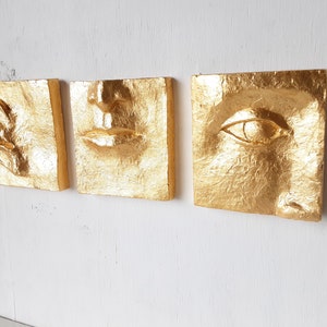 Gold ceramic wall face