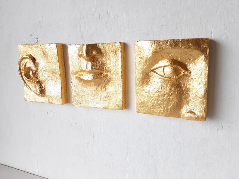 Gold ceramic wall face