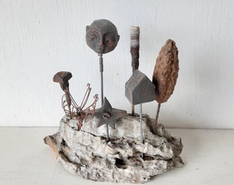 Rustic sculpture with seven ceramic and recycled objects on a timber plinth, coffee table art, quirky decor from Louise Fulton Studio