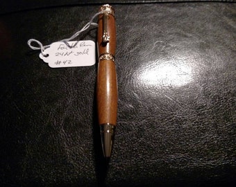Amazing 24kt gold plated faith pen. It is brand new just created by ksbwoodworking. It is made from an awesome piece of red heart.
