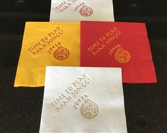 May include: Four napkins with the text "TIME TO PLAY MAH JONGG! JOKER" printed in gold on a white, yellow, red, and white background.