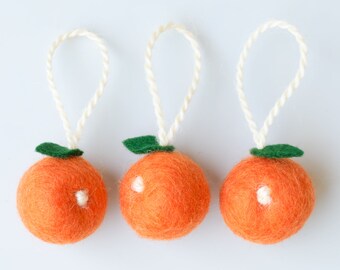 Mini felt orange hanging decorations. Set of three miniature fruit decorations.