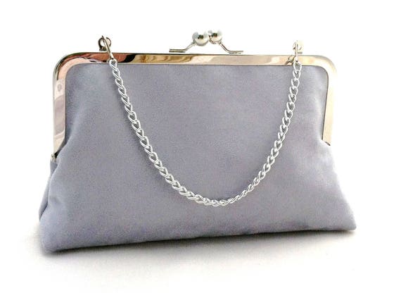 light grey suede clutch bag