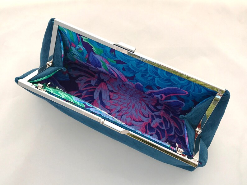 teal suede handbag