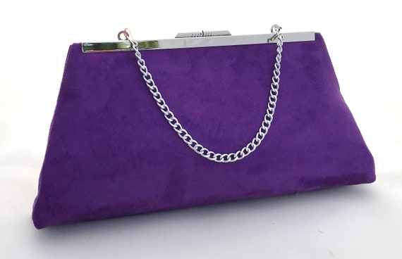 purple suede clutch bag