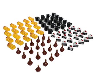 May include: An assortment of miniature food items, including yellow croissants, black coffee mugs, small cakes with white frosting and strawberries, and brown decorative bottles. The items are arranged on a white background.