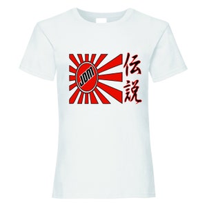 May include: White t-shirt featuring a red and black graphic of a rising sun with the word "JDM" in a circle and the Japanese characters "伝説" (densetsu) meaning "legend" to the right.