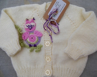 Knitted bird baby sweater, baby cardigan in cream with raglan sleeves, 3 - 6 months.