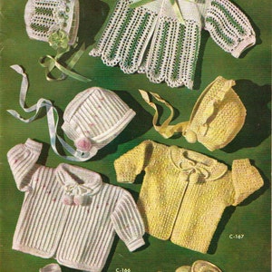 May include: A set of crocheted baby clothes, including a white cardigan, a white hat, a yellow cardigan, a yellow hat, and a pair of white booties. The clothes are laid out on a green background. C-166, C-167, and C-168 are written on the image.