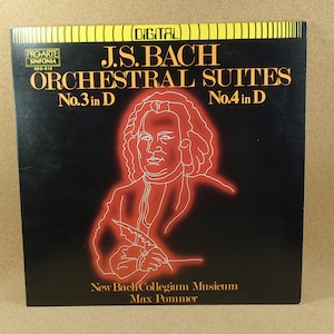May include: A black vinyl record album cover with gold lettering. The cover features a red line drawing of Johann Sebastian Bach, the composer of the orchestral suites. The album title is "J.S. Bach Orchestral Suites" with the suite numbers "No. 3 in D" and "No. 4 in D". The album is by the New Bach Collegium Musicum conducted by Max Pommer.