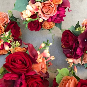 Fall bouquet. Wedding flowers. Orange, red, gold. Includes groom boutonniere.