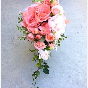 Coral bouquet. Cascade wedding flowers.