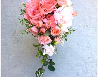 Coral bouquet. Cascade wedding flowers.